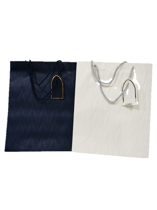 Bolsa de regalo de cartón de 26x32 cm con hojas